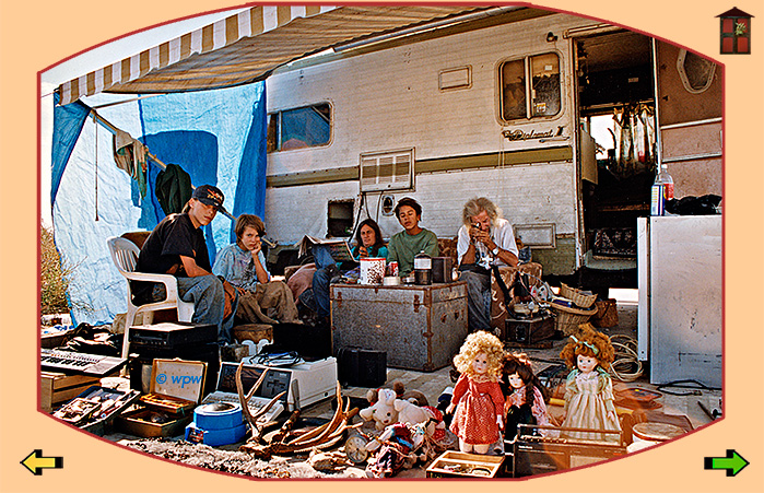 <Picture by Wolf P. Weber of a garage sale outside an RV at Slab City, Niland CA>